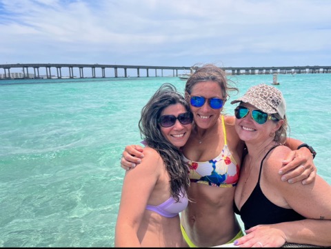ladies hanging out at crab island destin fl